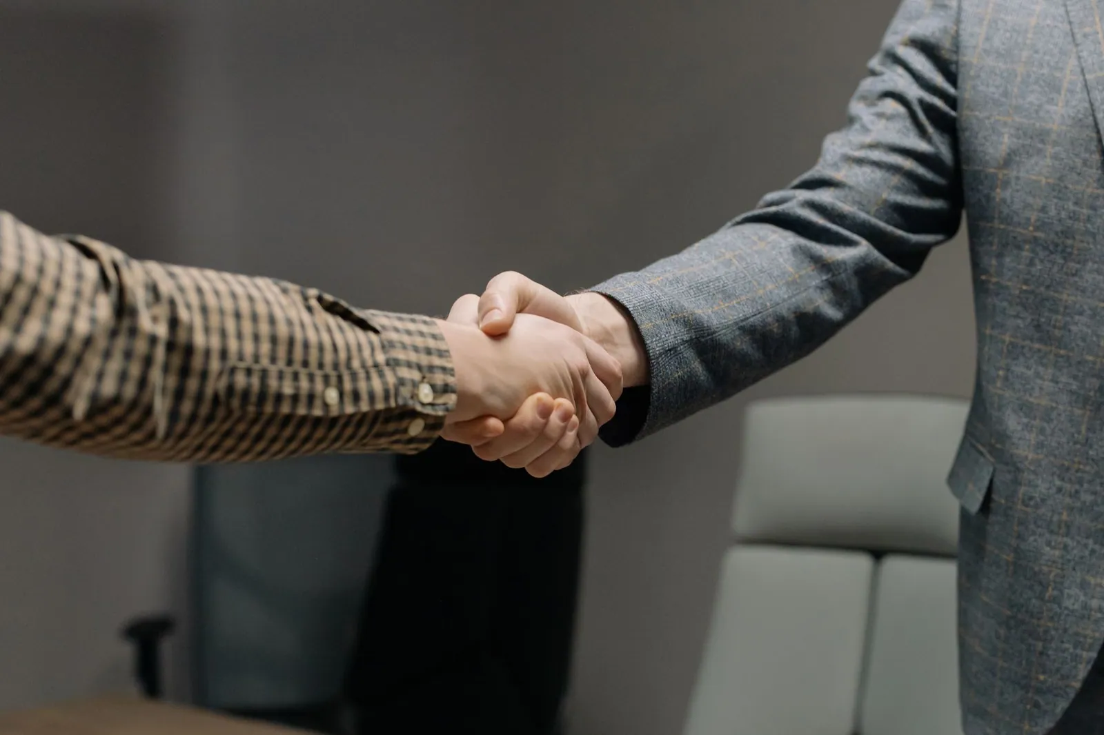 A coach reviewing progress with a long-term client